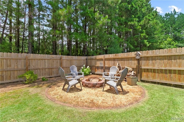 2757 Lily Cir, Northport, AL 35473 - fenced backyard with a fire pit