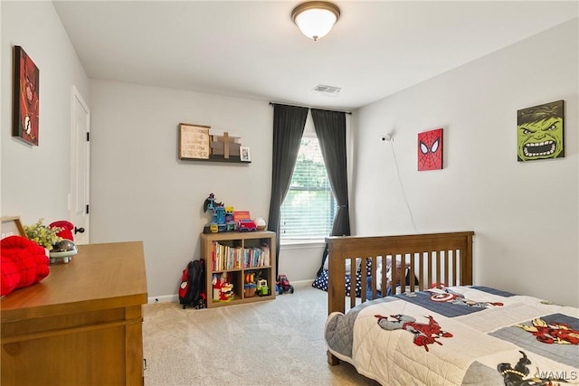 2757 Lily Cir, Northport, AL 35473 - carpeted bedroom featuring baseboards