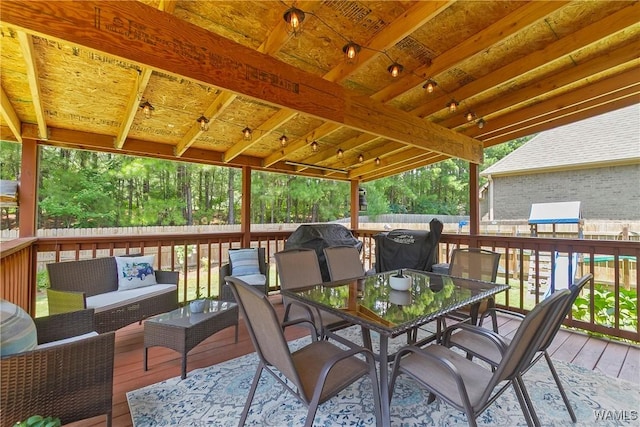 2757 Lily Cir, Northport, AL 35473 - deck with outdoor dining space, outdoor lounge area, and area for grilling