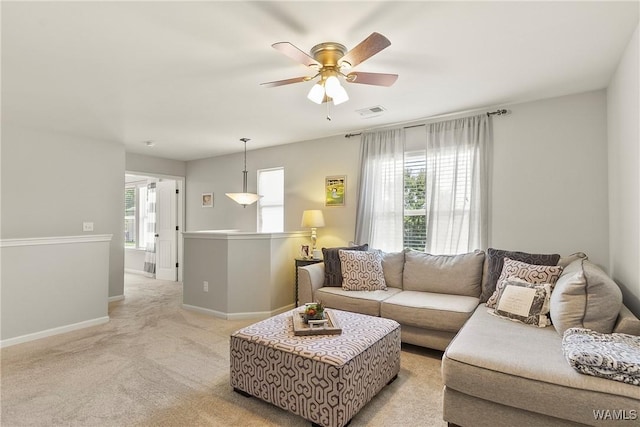 2757 Lily Cir, Northport, AL 35473 - living area featuring ceiling fan and light colored carpet