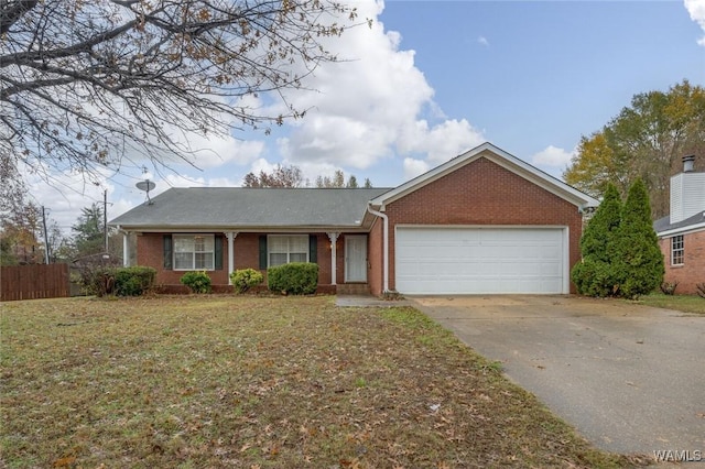 ranch-style house with a garage and a front lawn