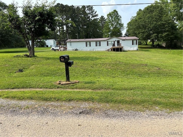 743 Greentree Dr, West Blocton, AL 35188 - manufactured / mobile home featuring a front lawn
