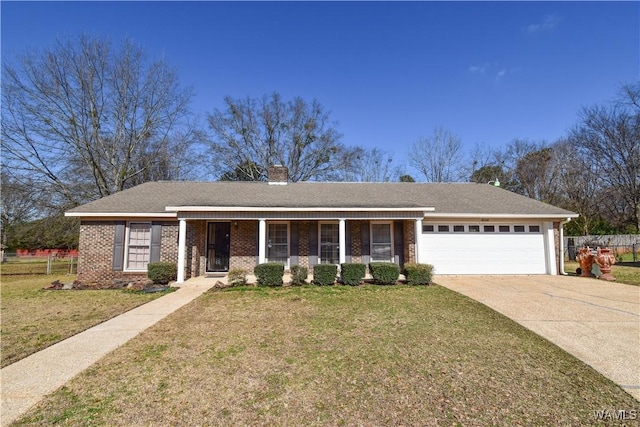 ranch-style home featuring a garage, a chimney, concrete driveway, and a front lawn