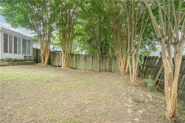 6128 Covington Villas Dr, Tuscaloosa, AL 35405 - fenced backyard with a sunroom