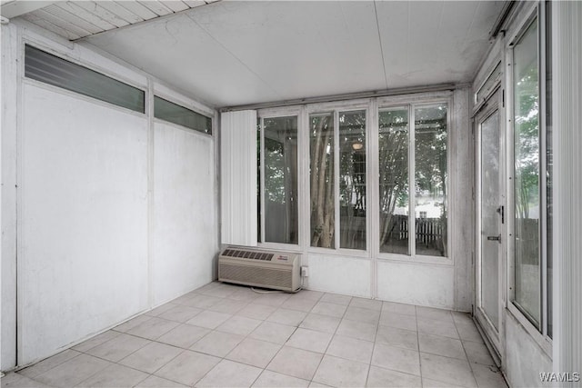 6128 Covington Villas Dr, Tuscaloosa, AL 35405 - unfurnished sunroom with a wall mounted air conditioner and tile patterned flooring