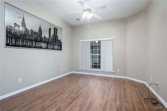 6128 Covington Villas Dr, Tuscaloosa, AL 35405 - empty room featuring wood finished floors and a ceiling fan