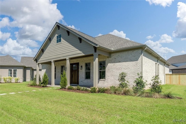 407 Edgefield Mews Cir, Tuscaloosa, AL 35406 - view of front of property featuring covered porch, brick siding, and a shingled roof