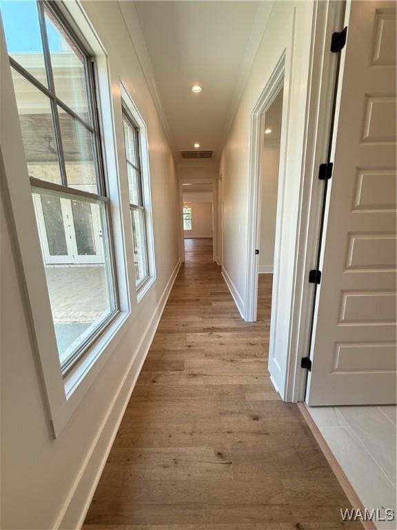 407 Edgefield Mews Cir, Tuscaloosa, AL 35406 - hallway with light wood-style flooring, recessed lighting, and crown molding