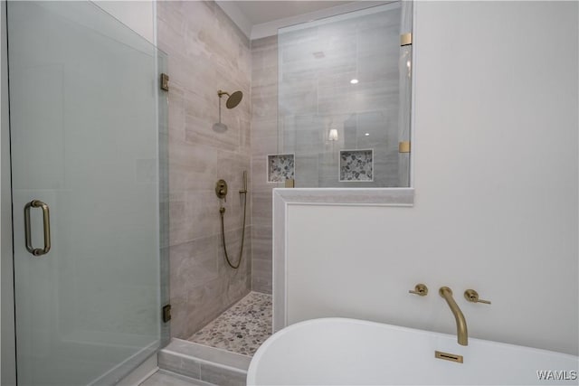 407 Edgefield Mews Cir, Tuscaloosa, AL 35406 - bathroom featuring a stall shower and a freestanding bath