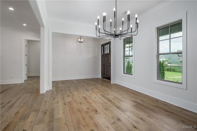 407 Edgefield Mews Cir, Tuscaloosa, AL 35406 - unfurnished dining area featuring a chandelier, wood-type flooring, crown molding, and recessed lighting
