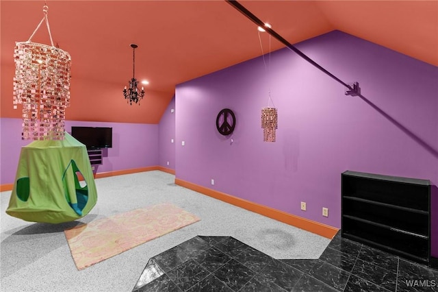 120 Magnolia Cir, Centreville, AL 35042 - carpeted home theater with vaulted ceiling and a chandelier