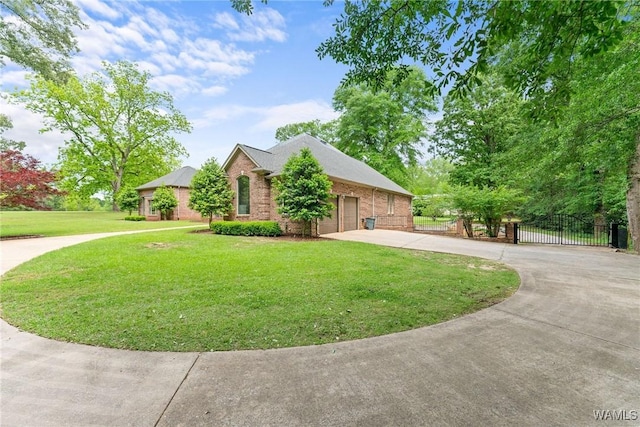 120 Magnolia Cir, Centreville, AL 35042 - view of front facade featuring driveway, a gate, an attached garage, and brick siding