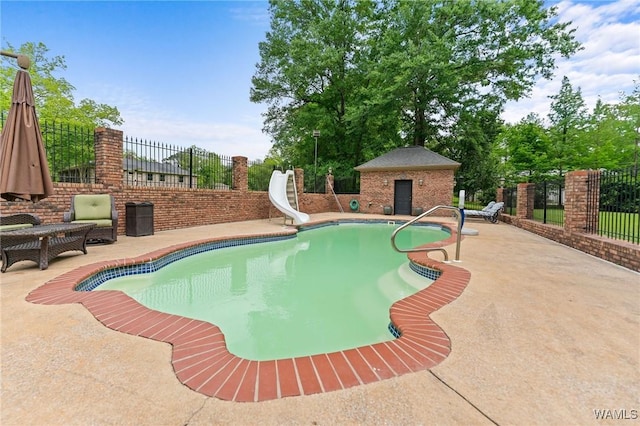 120 Magnolia Cir, Centreville, AL 35042 - view of pool featuring a water slide and a patio