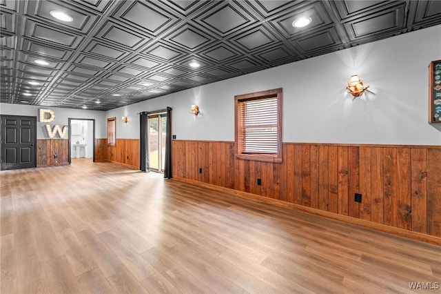 120 Magnolia Cir, Centreville, AL 35042 - unfurnished living room with a wainscoted wall, wood finished floors, an ornate ceiling, wooden walls, and recessed lighting