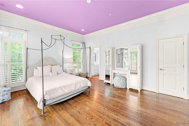 120 Magnolia Cir, Centreville, AL 35042 - bedroom featuring ornamental molding, multiple windows, and wood finished floors