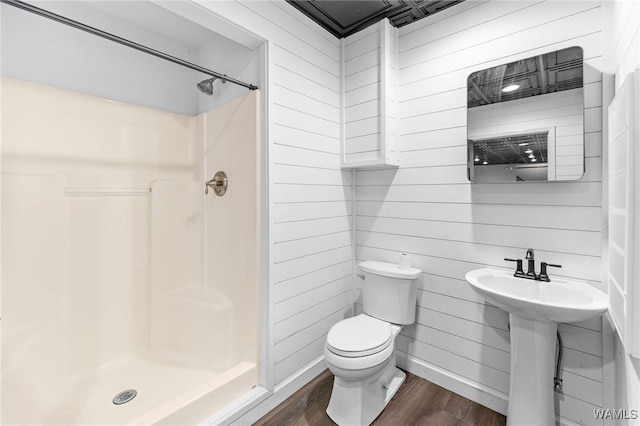 120 Magnolia Cir, Centreville, AL 35042 - full bathroom with wood finished floors, a stall shower, and wooden walls