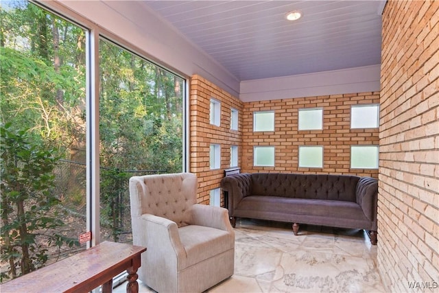 sunroom featuring a wealth of natural light