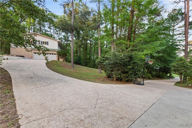 exterior space featuring a garage and driveway