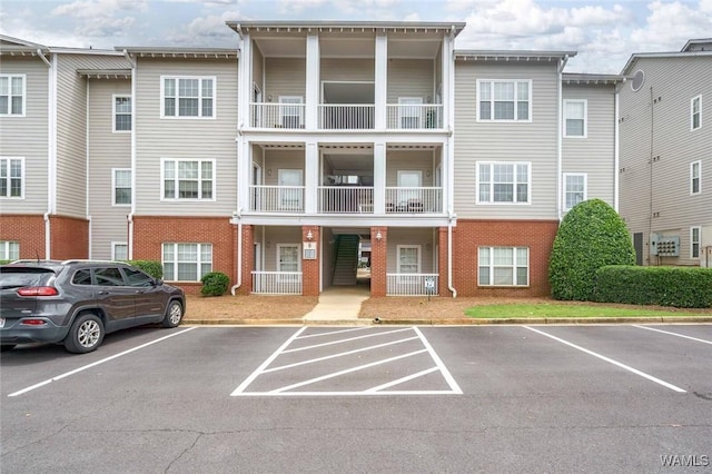 303 Helen Keller Blvd Unit B319, Tuscaloosa, AL 35404 - view of property with uncovered parking