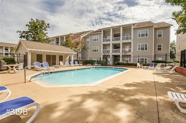 303 Helen Keller Blvd Unit B319, Tuscaloosa, AL 35404 - community pool featuring a patio
