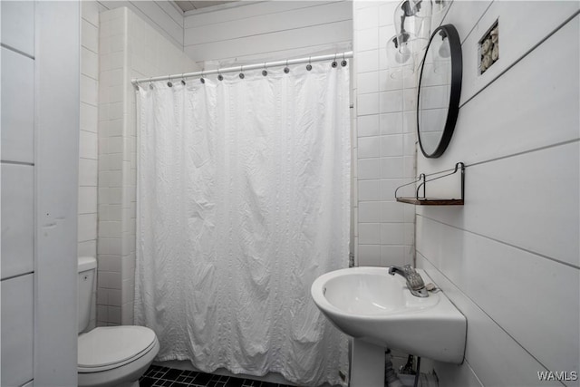 221 3rd Ct SW, Fayette, AL 35555 - bathroom featuring toilet and tile patterned floors