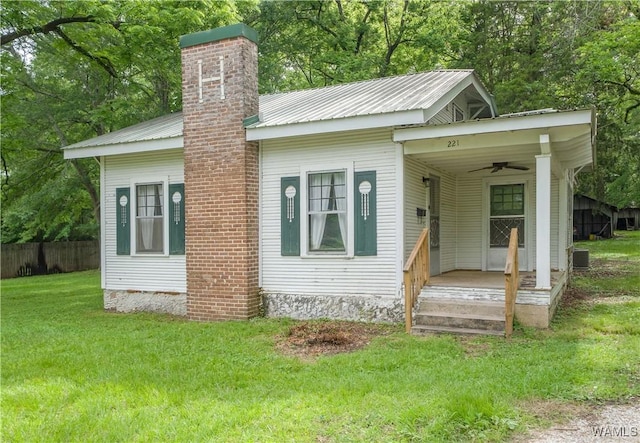 221 3rd Ct SW, Fayette, AL 35555 - bungalow featuring ceiling fan, a chimney, and a metal roof