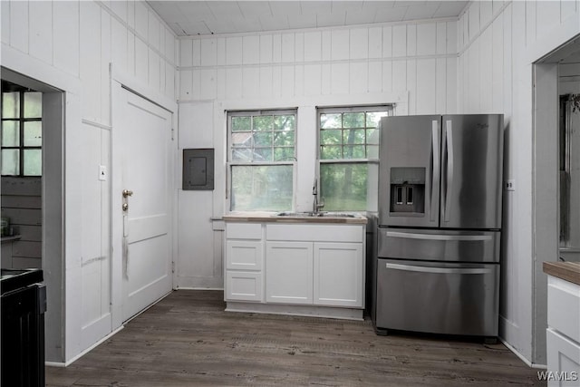 221 3rd Ct SW, Fayette, AL 35555 - kitchen featuring stainless steel refrigerator with ice dispenser, white cabinetry, dark wood-style flooring, electric panel, and light countertops