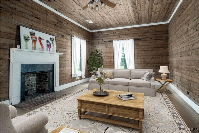 221 3rd Ct SW, Fayette, AL 35555 - living area featuring a fireplace, wooden walls, ceiling fan, wooden ceiling, and wood finished floors
