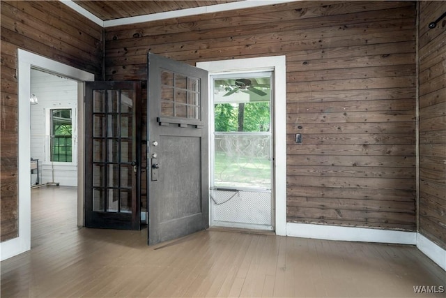 221 3rd Ct SW, Fayette, AL 35555 - unfurnished room featuring wood walls and hardwood / wood-style flooring
