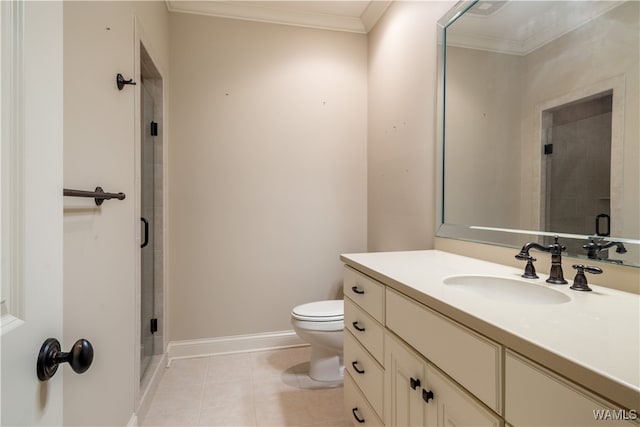 bathroom featuring tile patterned flooring, vanity, a shower with shower door, and crown molding