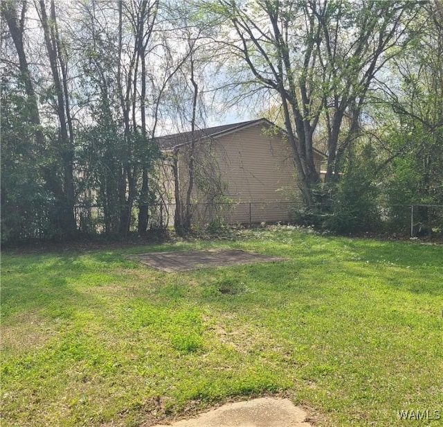 view of yard with fence