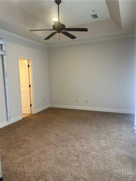 11408 Belle Meade Way, Northport, AL 35475 - empty room featuring ornamental molding, carpet floors, a ceiling fan, and baseboards