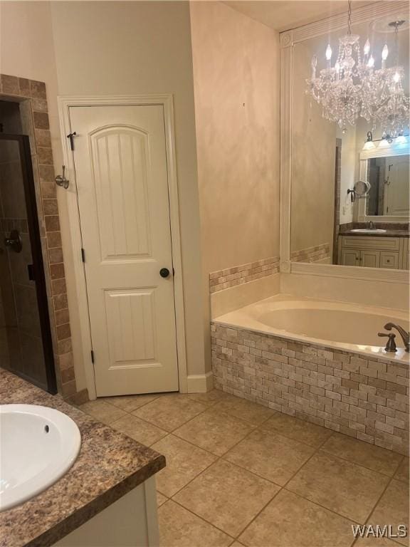 11408 Belle Meade Way, Northport, AL 35475 - bathroom featuring vanity, a bath, tile patterned floors, a shower stall, and a chandelier