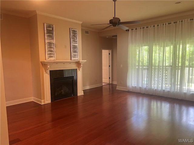 11408 Belle Meade Way, Northport, AL 35475 - unfurnished living room featuring dark wood-style floors, a ceiling fan, crown molding, baseboards, and a tile fireplace