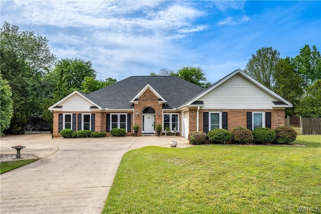 ranch-style home with a front lawn