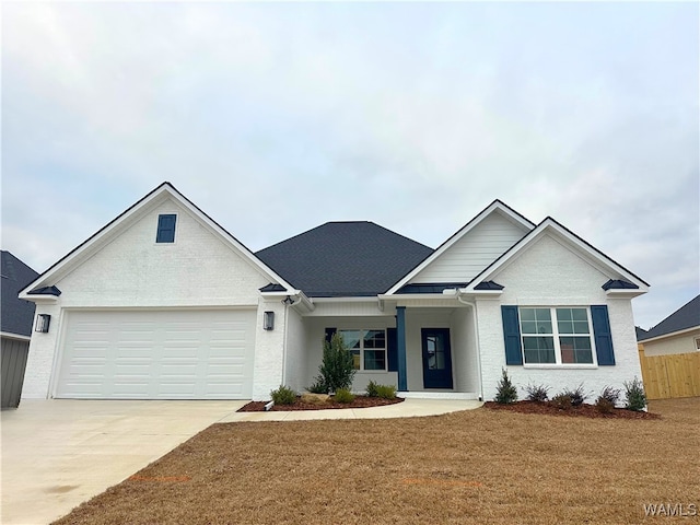 view of front of property featuring a garage