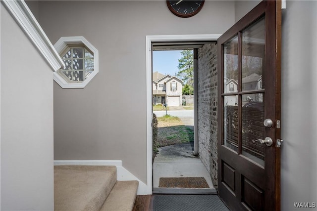 foyer entrance featuring stairway