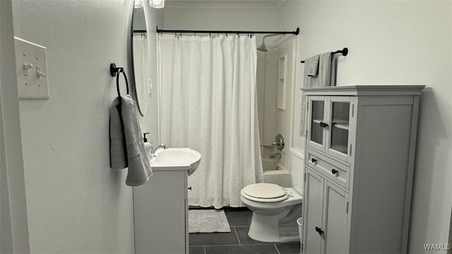 full bathroom featuring shower / tub combo with curtain, tile patterned floors, toilet, ornamental molding, and vanity