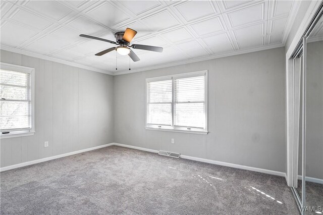 65 Wooley Rd, Brent, AL 35034 - unfurnished bedroom with carpet floors, baseboards, ceiling fan, ornamental molding, and an ornate ceiling