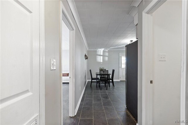 65 Wooley Rd, Brent, AL 35034 - corridor with dark tile patterned flooring and baseboards