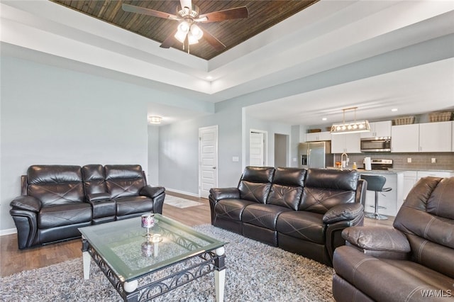 320 Rob Lee St, Moundville, AL 35474 - living room with wood finished floors, wood ceiling, ceiling fan, recessed lighting, and a tray ceiling