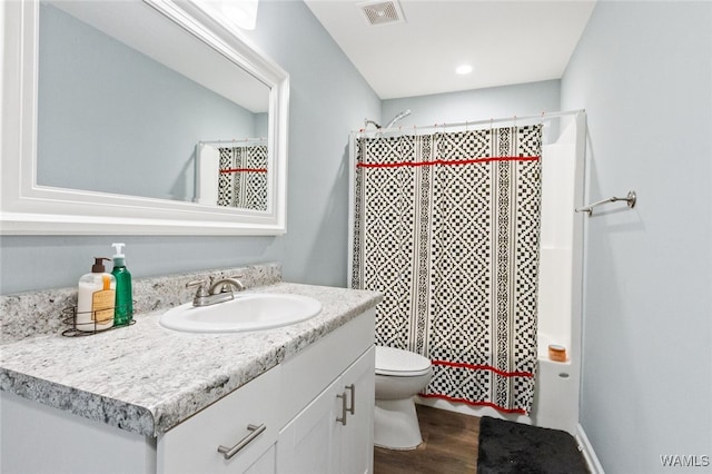 320 Rob Lee St, Moundville, AL 35474 - bathroom featuring vanity, wood finished floors, and a shower with shower curtain