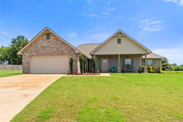 320 Rob Lee St, Moundville, AL 35474 - view of front of home featuring brick siding, a garage, and driveway