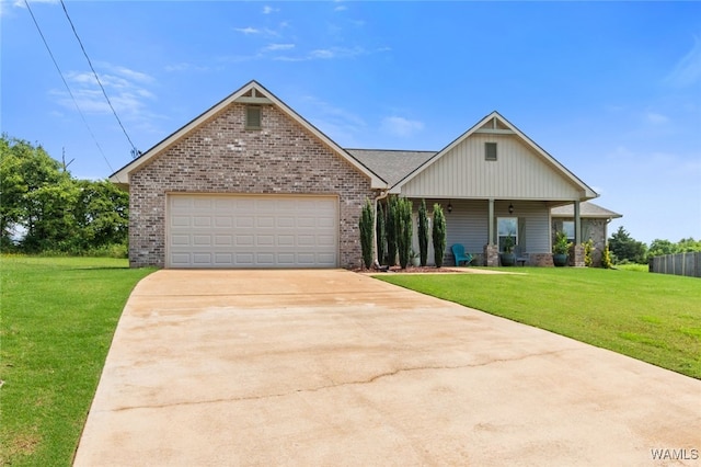 320 Rob Lee St, Moundville, AL 35474 - view of front facade with a front lawn, a garage, brick siding, and concrete driveway