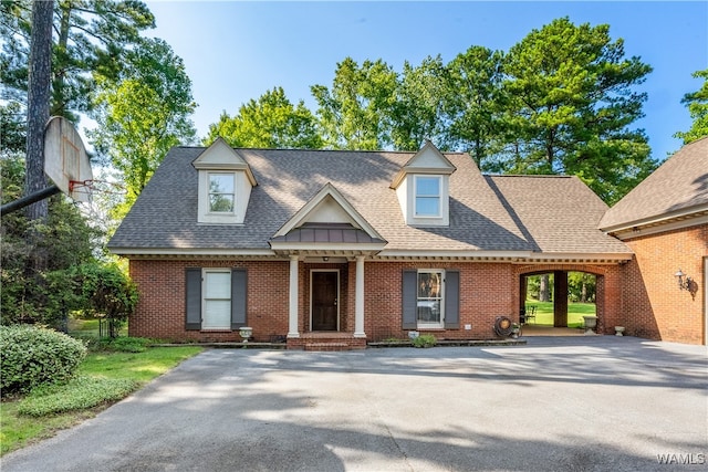 view of front facade with a carport