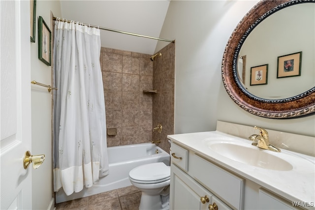 full bathroom featuring toilet, tile patterned floors, vanity, and shower / tub combo with curtain