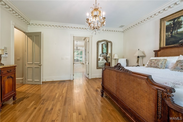 bedroom featuring crown molding, light hardwood / wood-style flooring, and an inviting chandelier