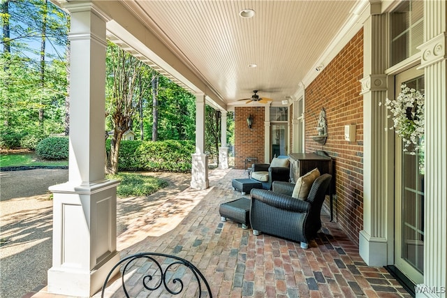 view of patio featuring ceiling fan