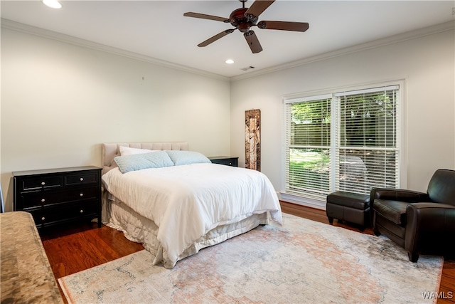 bedroom with ceiling fan, crown molding, and wood-type flooring