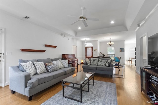 839 Seven Oaks Pl, Tuscaloosa, AL 35406 - living room with wood finished floors, a ceiling fan, a chandelier, a raised ceiling, and recessed lighting